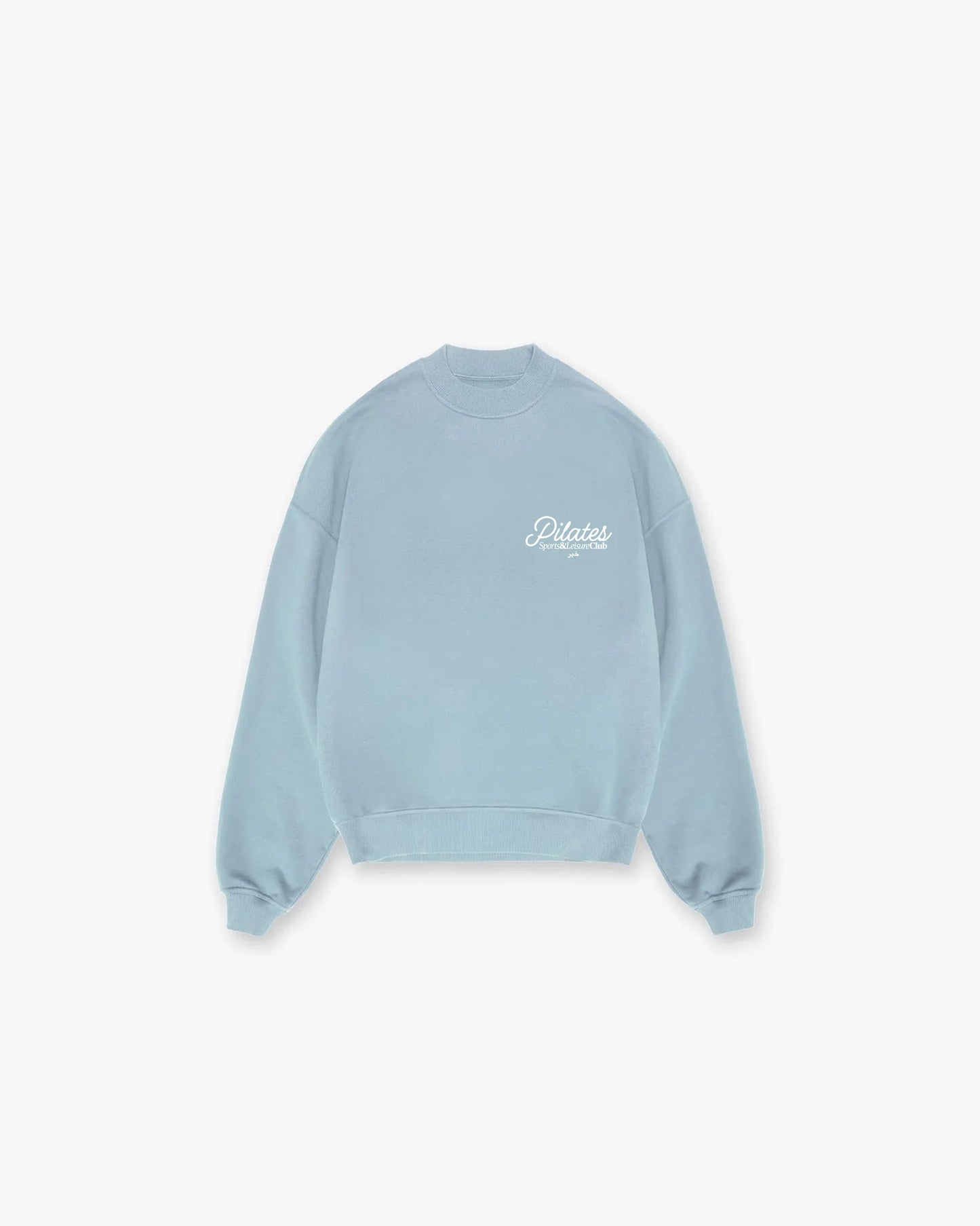 Oversized powder blue crewneck with small white Pilates Sports & Leisure Club logo on chest, heavyweight cotton sweatshirt.