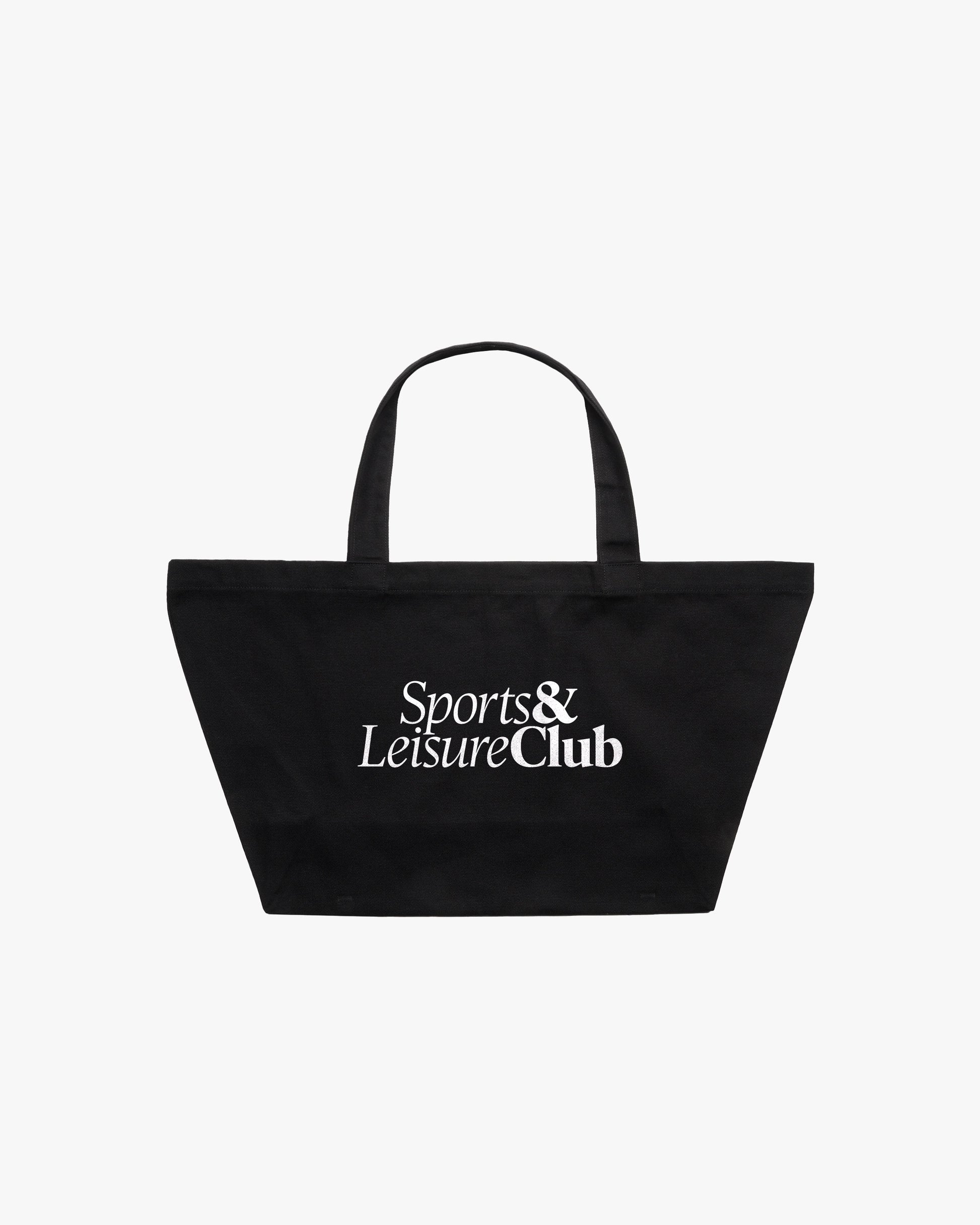 Large black canvas tote bag with white Sports & Leisure Club logo, oversized shopper bag made from heavyweight cotton for everyday and gym use.