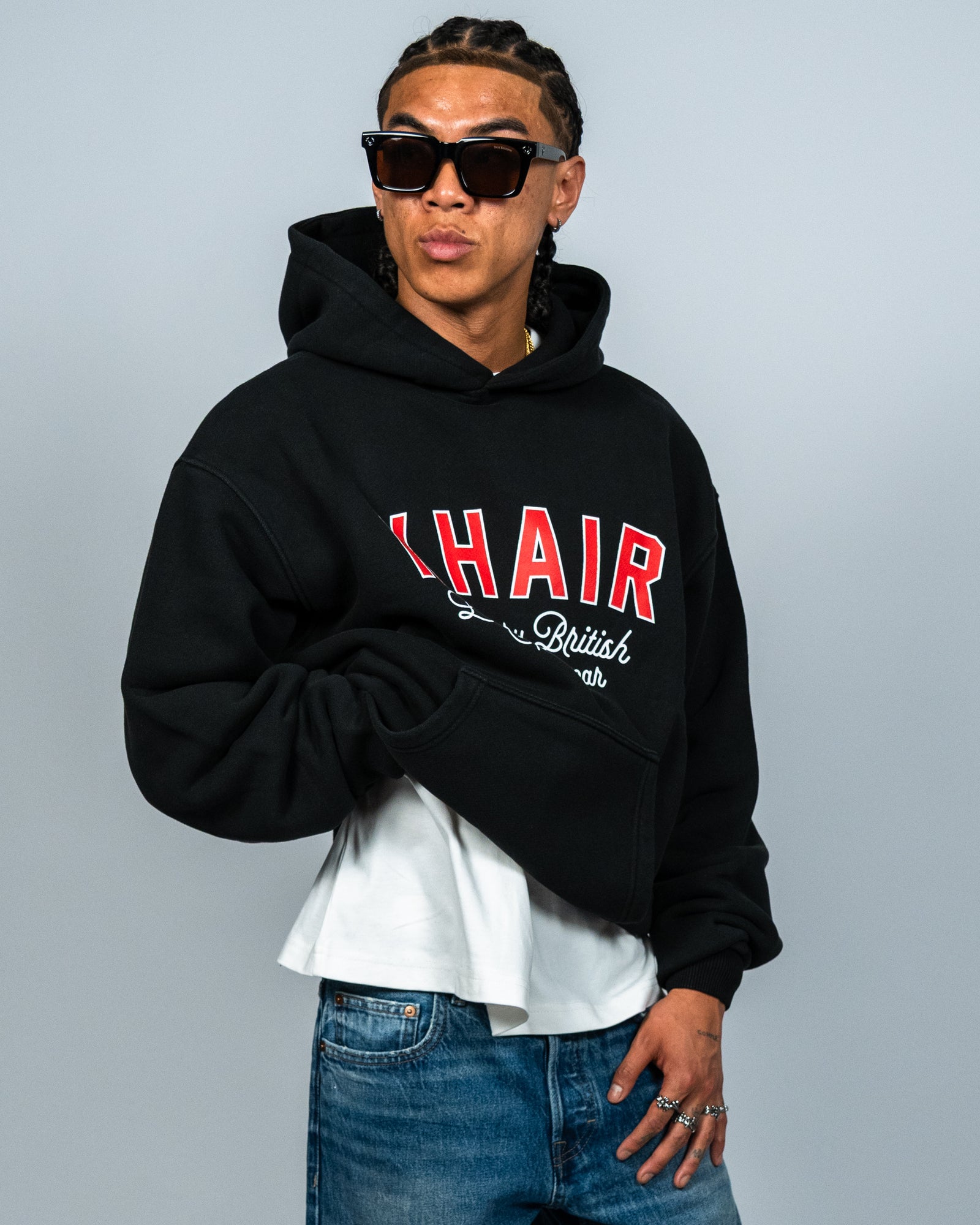 KHAIR oversized washed-black hoodie three-quarter front fit
