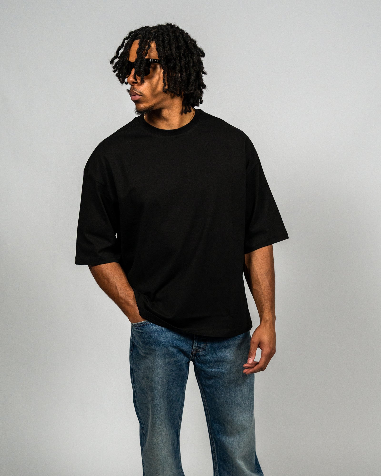 KHAIR Foundations black T-shirt three-quarter front fit