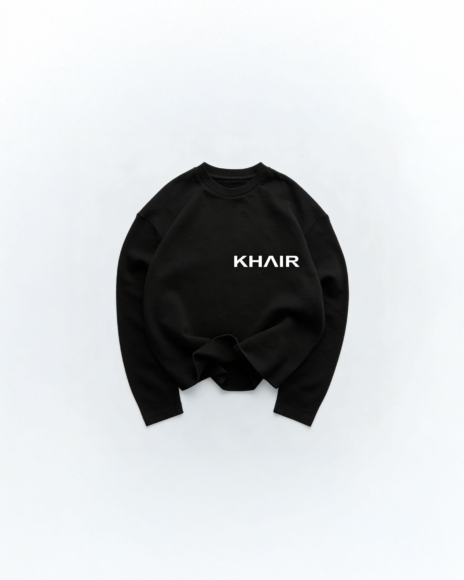 KHAIR Signature black long sleeve front product view