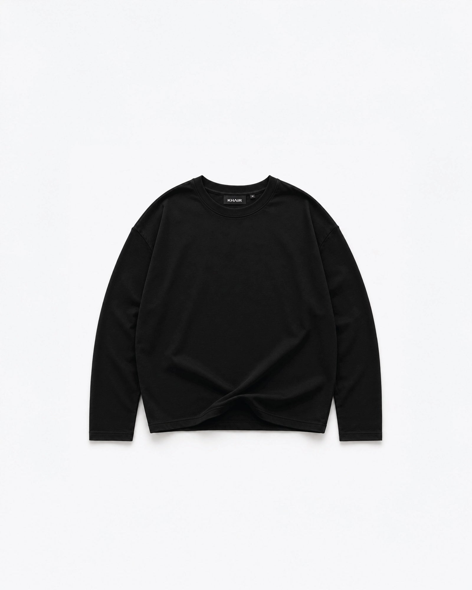 KHAIR Foundations black long sleeve front product view