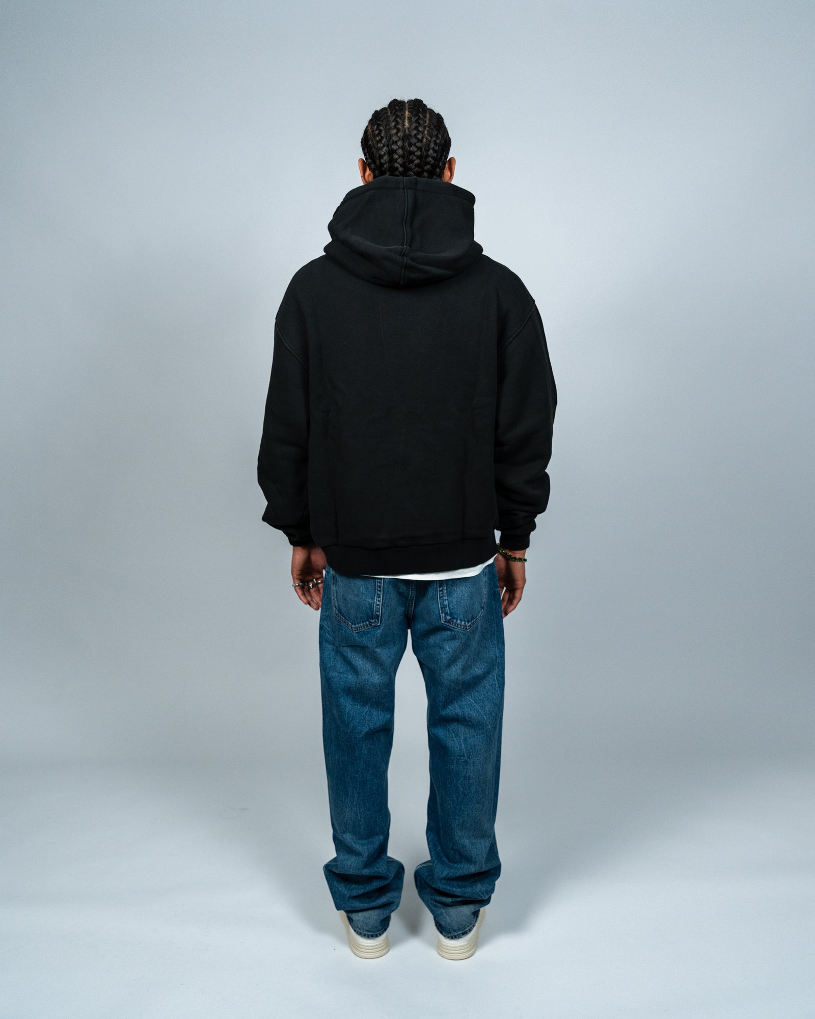 KHAIR oversized washed-black hoodie back fit on model