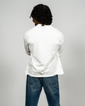 KHAIR Foundations off-white T-shirt back fit on model product view